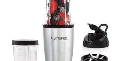 NutriPro Juicer Mixer Grinder - Smoothie Maker - 500 Watts with multiple accessories, including blending cups, a blade attachment, and a to-go lid, shown with fresh fruits inside.